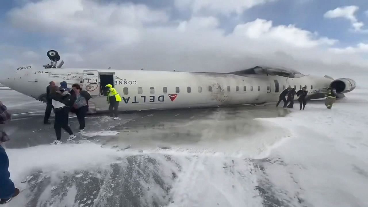 Passengers injured as plane flips upside down at Toronto airport